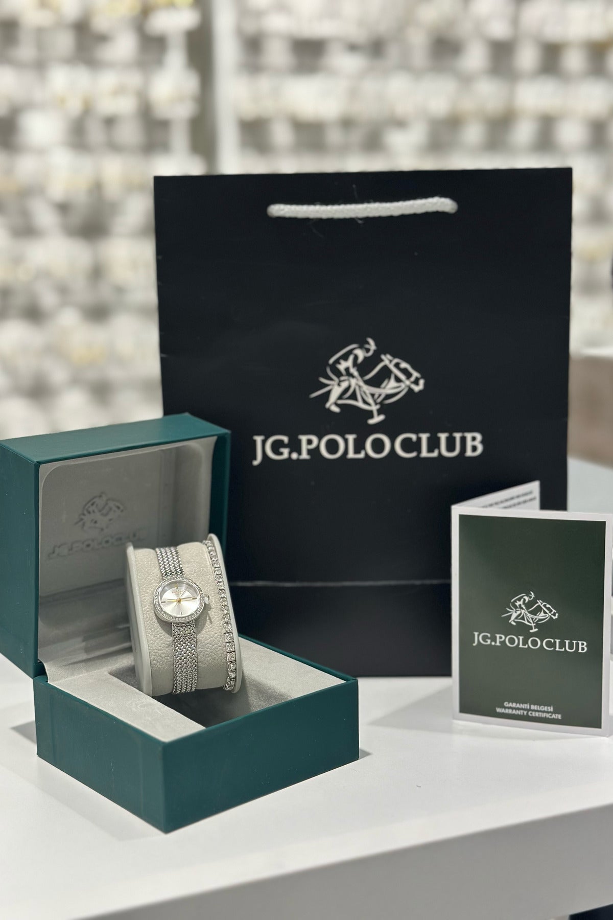 J.G. Polo Club Orijinal Çelik Kasa Çelik Kordon Su Geçirmez 2 Yıl Garantili Kadın Kol Saati (JPC.0426T02477M)