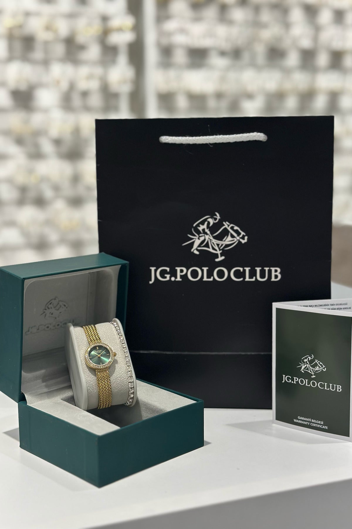 J.G. Polo Club Orijinal Çelik Kasa Çelik Kordon Su Geçirmez 2 Yıl Garantili Kadın Kol Saati (JPC.0426T02477M)